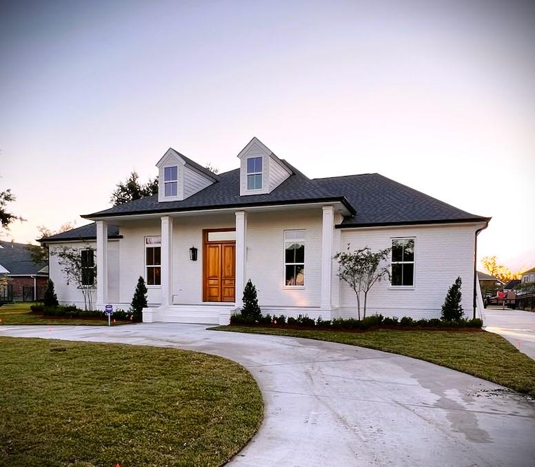 white house with wooden door